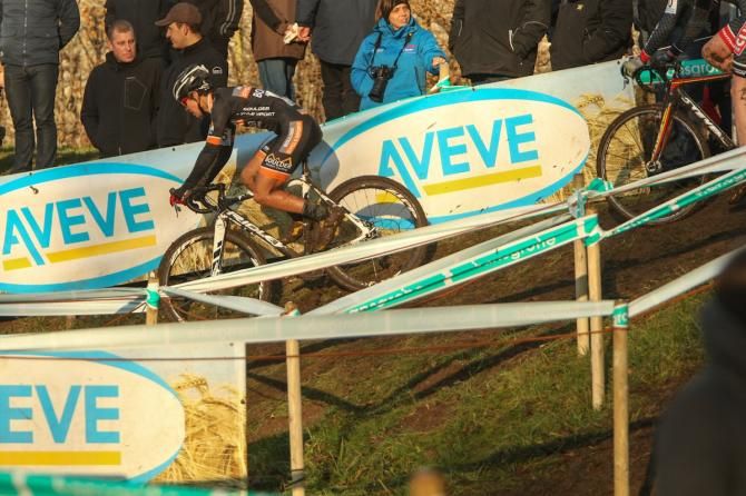The later afternoon sun beats down on the riders at Diegem. Chris Key leads out a fellow American early on in the race.