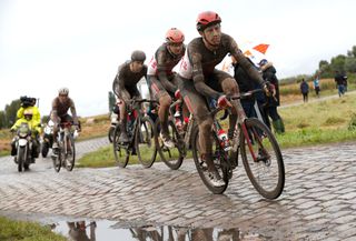 ROUBAIX FRANCE OCTOBER 03 LR Florian Vermeersch of Belgium and Harry Sweeny of Australia and Team Lotto Soudal compete in the breakaway through cobblestones sector during the 118th ParisRoubaix 2021 Mens Eilte a 2577km race from Compigne to Roubaix ParisRoubaix on October 03 2021 in Roubaix France Photo by Bas CzerwinskiGetty Images