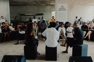 Limbo Museum interior with people attending event