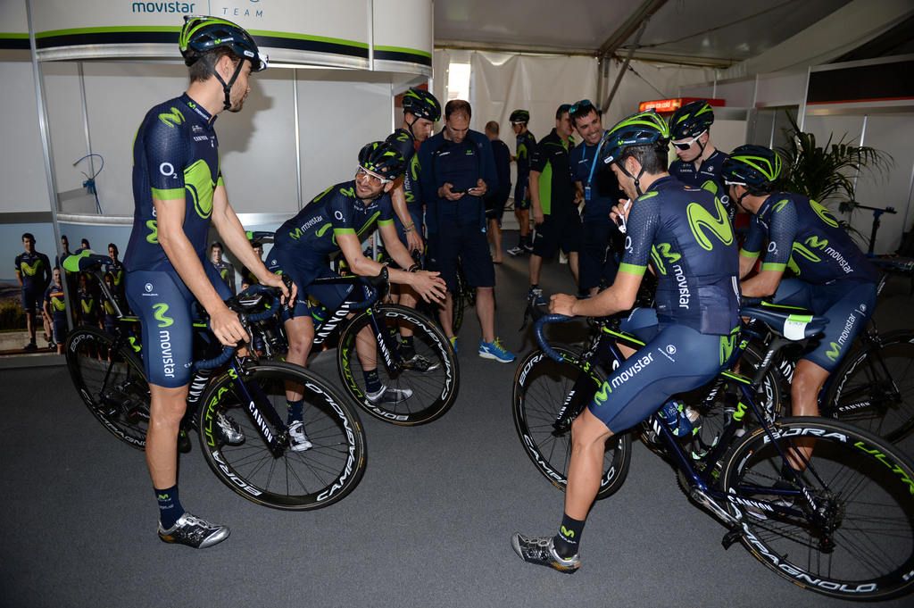 The Movistar team get instructions before heading out for a ride