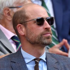 Prince William wearing sunglasses in the stands at Wimbledon