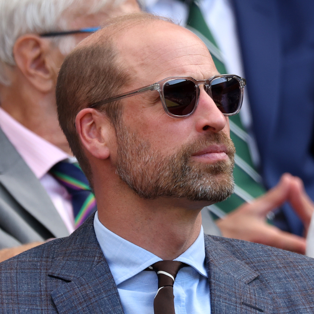 Prince William wearing sunglasses  in the stands at Wimbledon