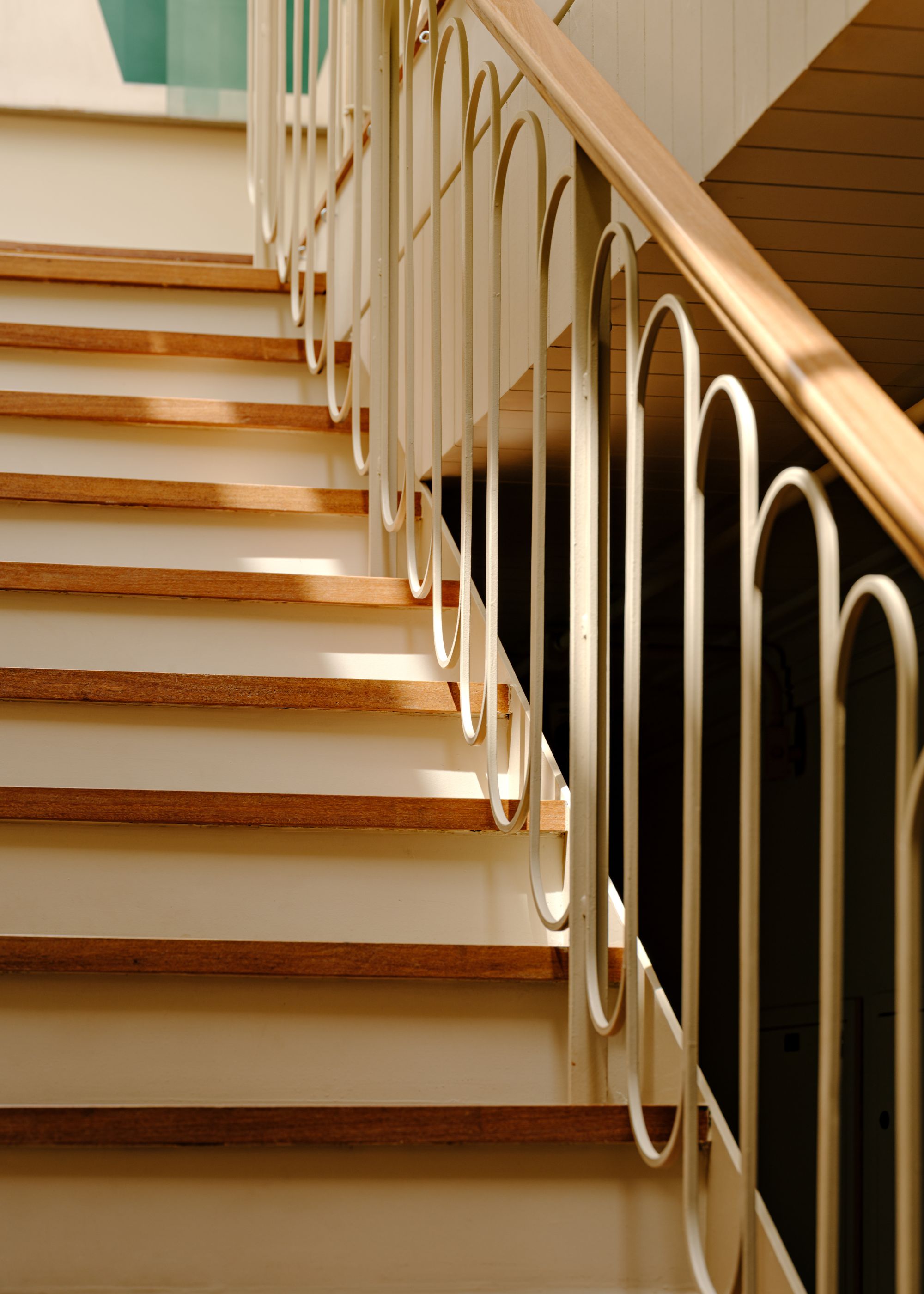 A staircase with decorative railings