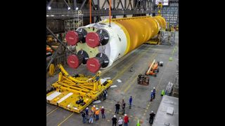 The 212-foot (65 m) tall core stage of NASA's Space Launch System has been lifted from its stand ahead of integration with solid rocket boosters.