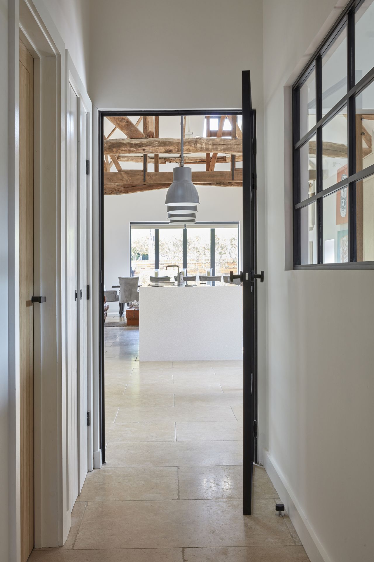 view from landing to bedroom through doors
