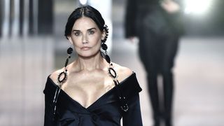 us actress demi moore presents a creation of british designer kim jones for the fendis spring summer 2021 collection during the paris haute couture fashion week, in paris, on january 27, 2021 british designer kim jones presents his first ever couture collection for fendi since he joinded italian fashion house fendi as its lead designer for womenswear in september 2020 photo by stephane de sakutin afp photo by stephane de sakutinafp via getty images