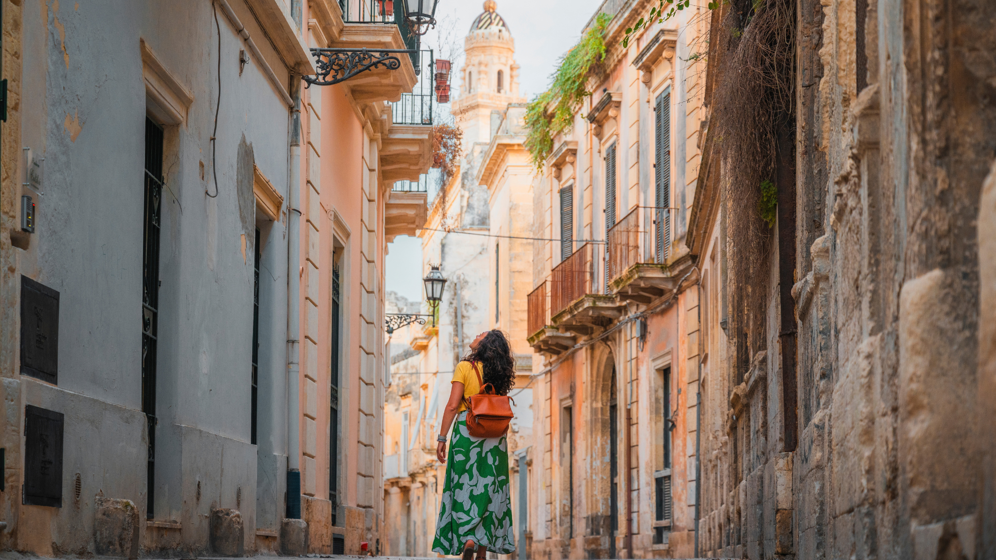 Woman walking down the street in Puglia 