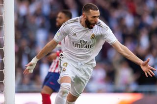 Karim Benzema celebrates a goal for Real Madrid against Atletico in February 2020.