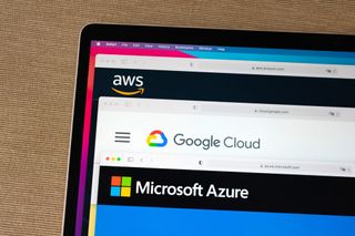 Amazon AWS, Google Cloud, and Microsoft Azure logos displayed on a laptop