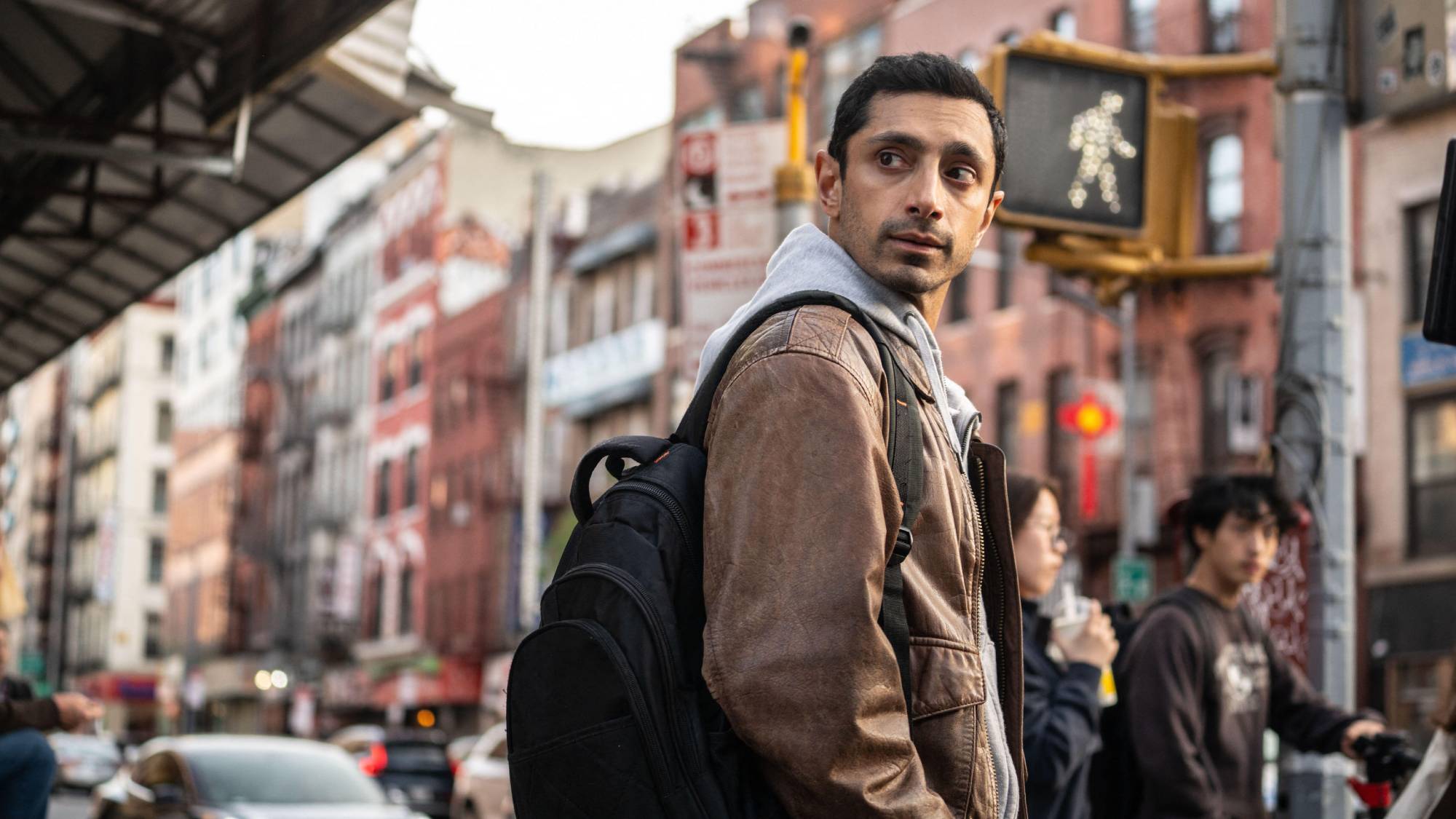 Riz Ahmed as The Fixer in "Relay"