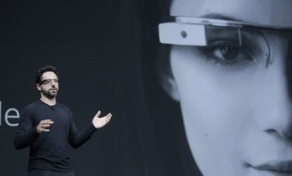 Google co-founder Segey Brin demonstrates Google Glass, a wearable interactive computer, on June 27: Apple might be creating its own head-mounted, hands-free computer.