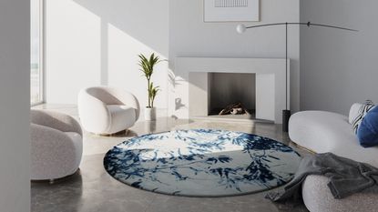 A round blue rug in an all-white scheme