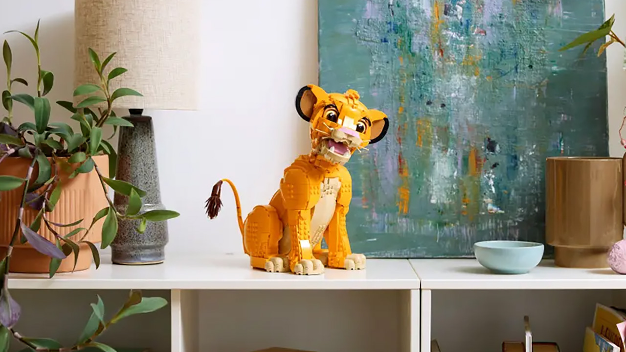 Lego Young Simba sitting on a bookcase