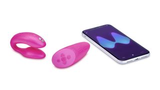 We-Vibe Chorus pictured next to a phone