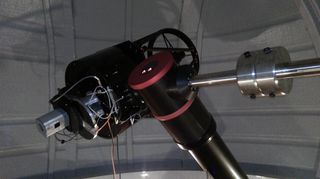 a telescope with a round filter over the end