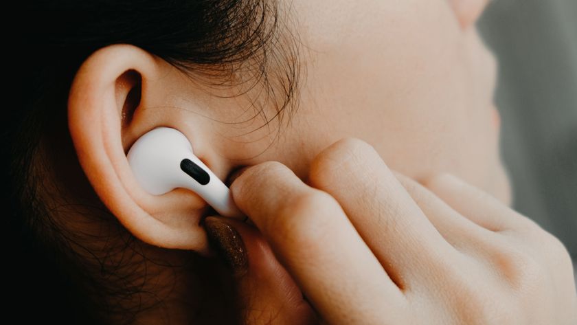 Close-up of woman using AirPods Pro 2