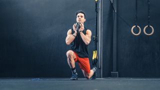 Man performs reverse lunge exercise