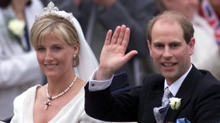 Prince Edward and Sophie greet well-wishers from an open carriage following their wedding