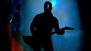A photograph of a mystery guitarist representing who might headline Download in 2017