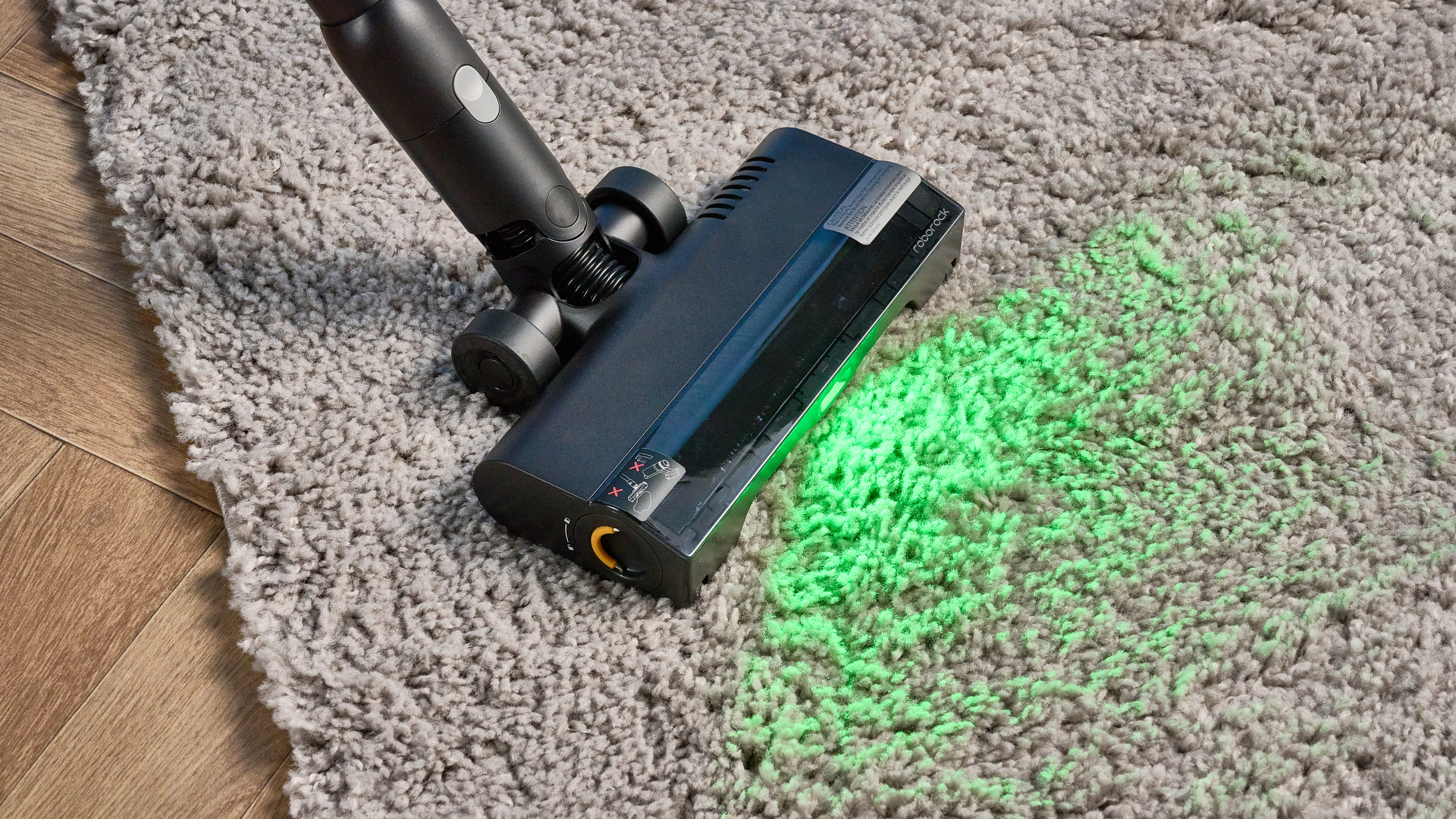 Roborock H60 Hub Ultra photograped in front f a blue background