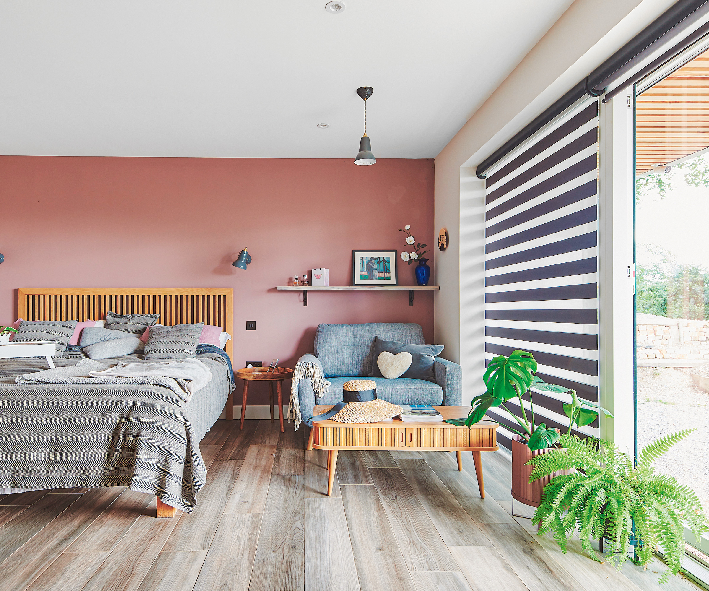 ground floor bedroom with full height windows