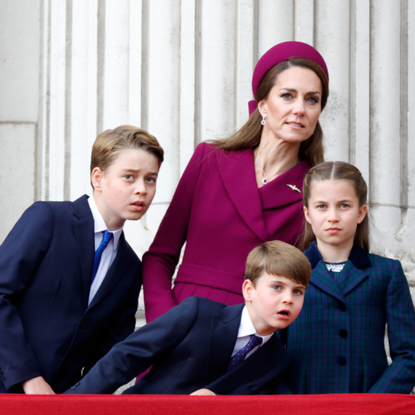 Prince George of Wales, Prince Louis of Wales, Catherine, Princess of Wales and Princess Charlotte of Wales watch a flypast from the balcony of Buckingham Palace to mark the 80th anniversary of VE Day on May 5, 2025 in London, England.