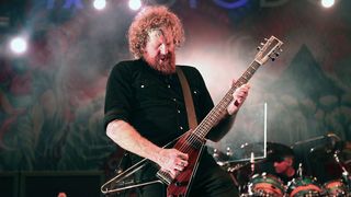 Brent Hinds of Mastodon performs at Rumsey Playfield, Central Park on May 19, 2015 in New York City