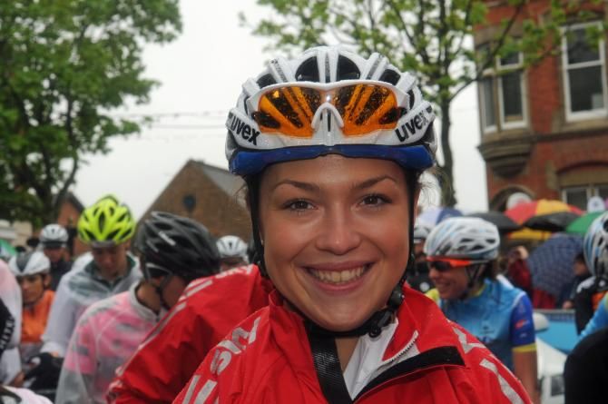 Lucy Garner smiles through the rain