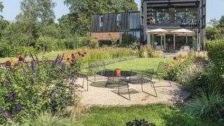 A zoned back garden with naturalistic planting