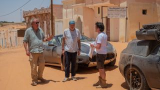 Jeremy Clarkson, James May and Richard Hammond (L-R) in a town for The Grand Tour