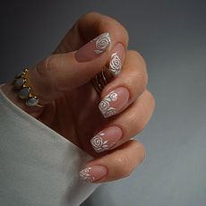 Photo of a white lace nail look