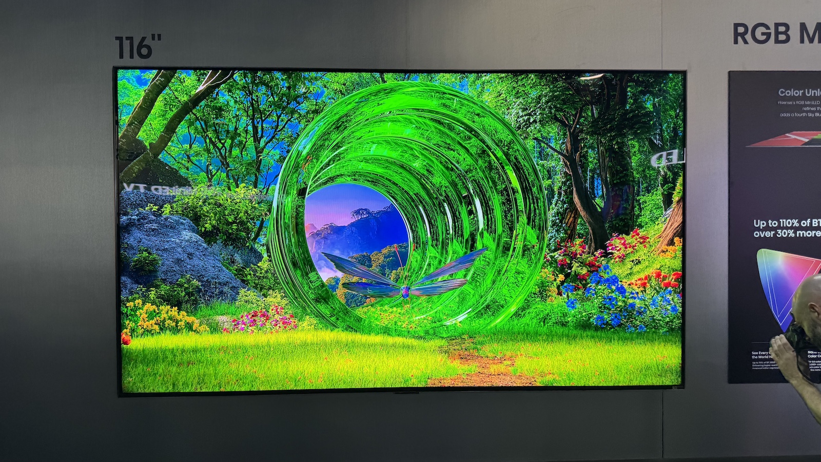 The Hisense 116UXS 116-inch RGB Mini LED TV, pictured on a stand at CES 2026