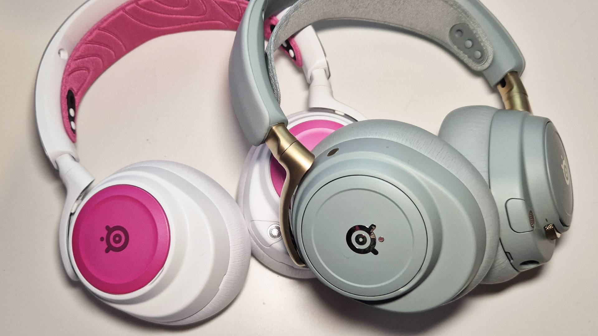 Photo of the Pro Wireless sitting under the Nova Elite headset.