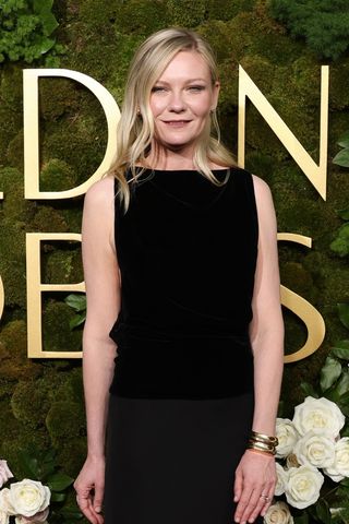 Kirsten Dunst is pictured with wavy hair and side fringe at the 82nd Annual Golden Globe Awards at The Beverly Hilton on January 05, 2025 in Beverly Hills, California.