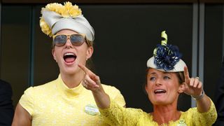 Zara Phillips and Dolly Maude watch the racing as they attend day 1 of Royal Ascot at Ascot Racecourse on June 16, 2015