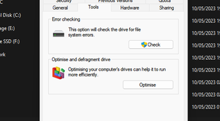 A screenshot of a Windows 11 menu showing an option to defragment a local drive