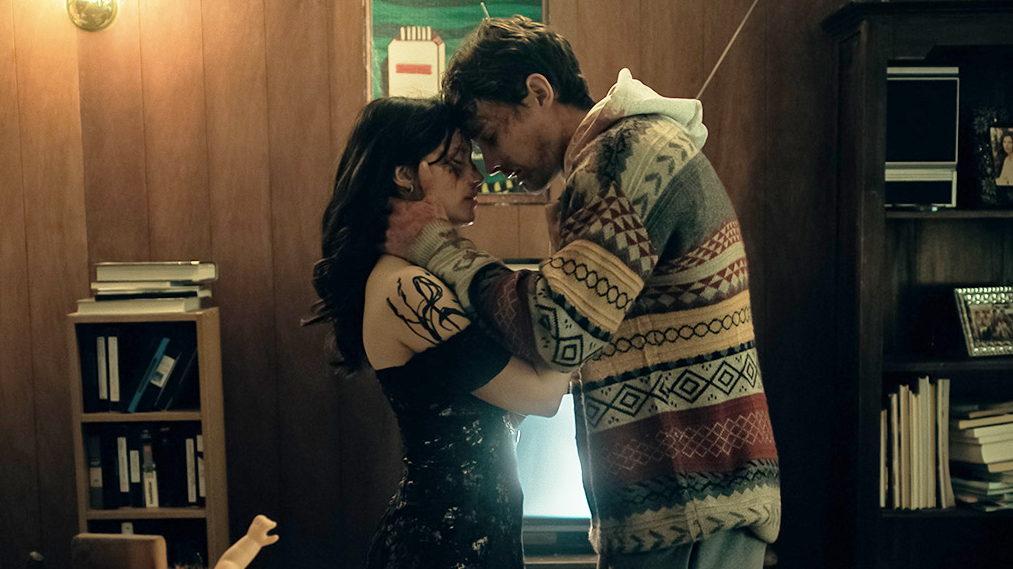 (L-R) Inde Navarrette as Nikki and Michael Johnston as Bear in "Obsession" (2026).