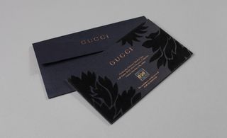 Gucci's thick dark indigo card for Milan Fashion Week