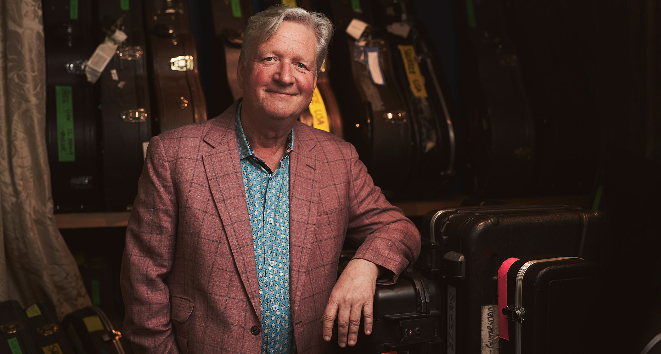 Squeeze frontman and guitarist Glenn Tilbrook pictured at home