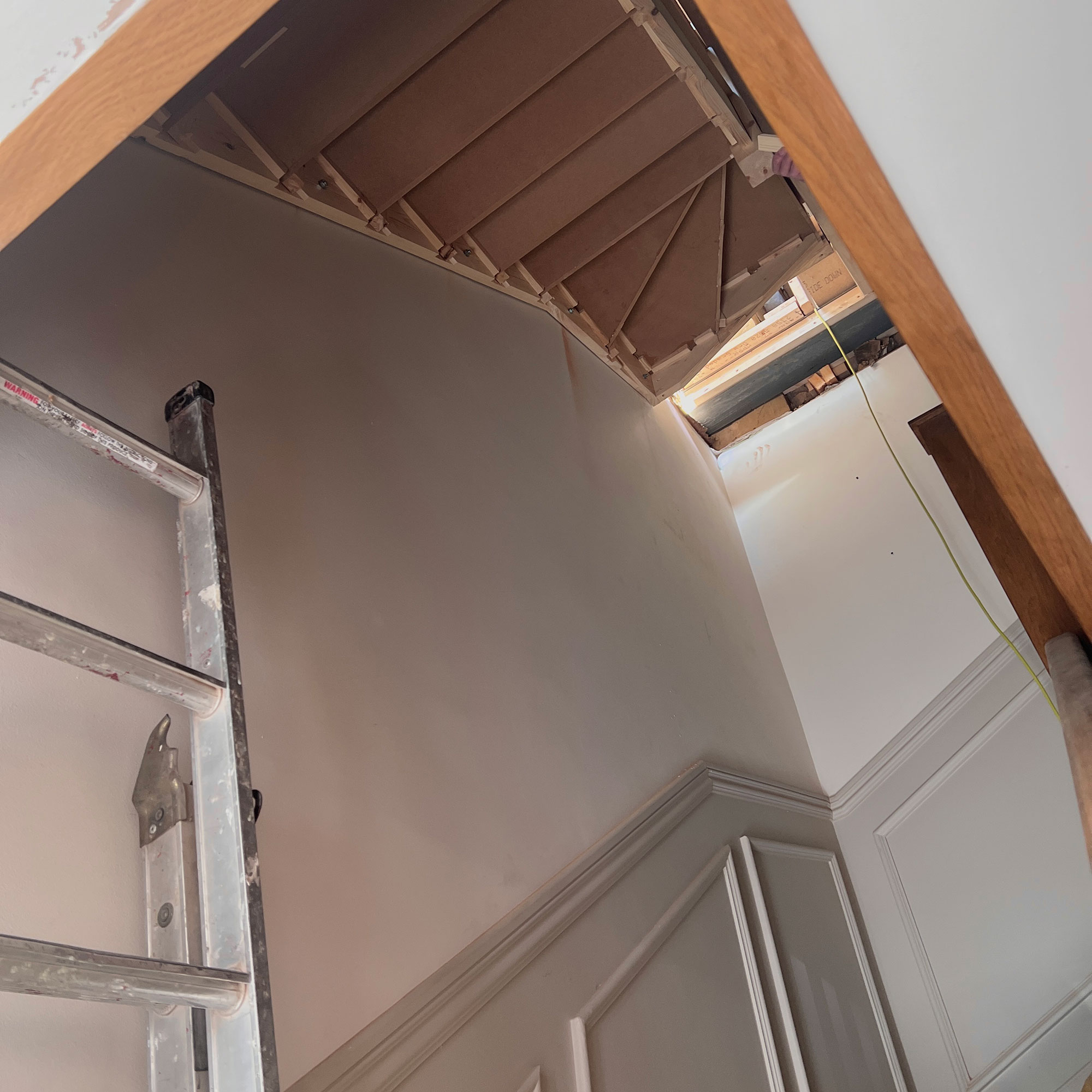 Newly built staircase as seen from lower floor