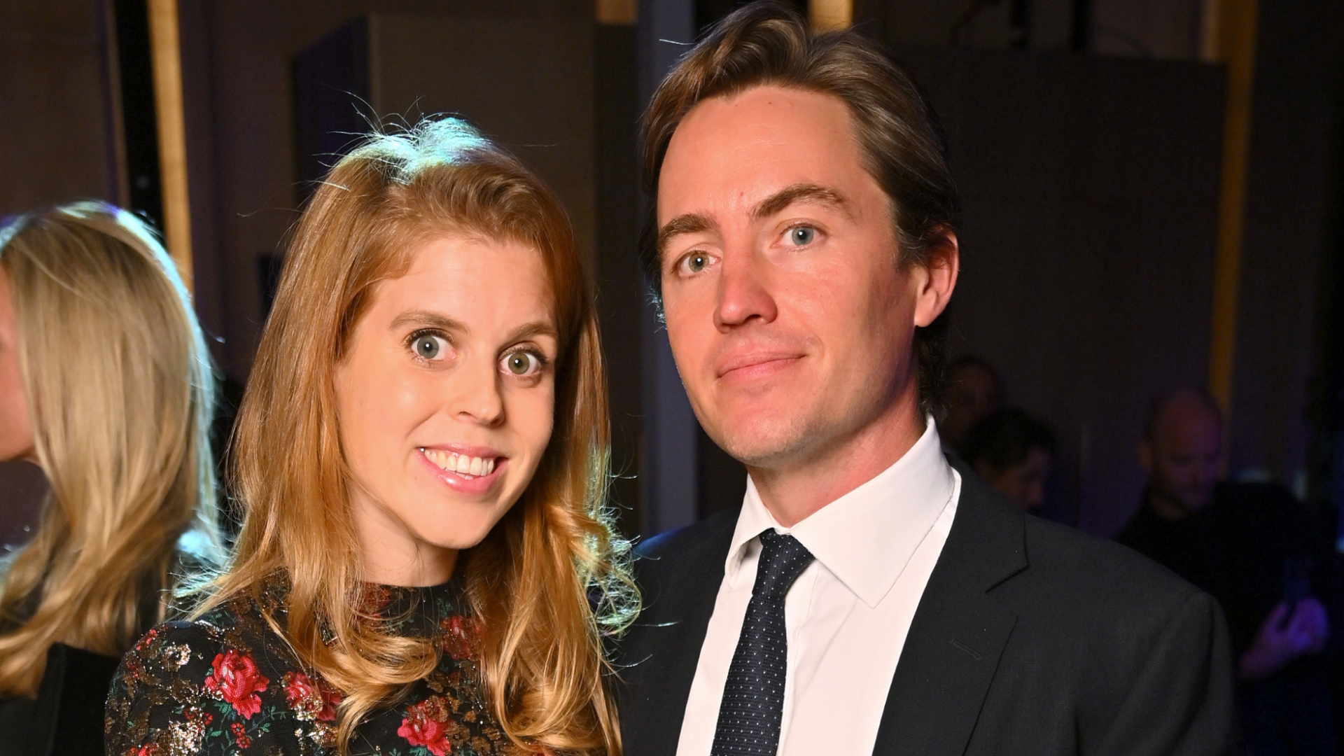 Princess Beatrice in a black and red sequined dress and Edoardo Mapelli Mozzi wearing a suit at a charity gala