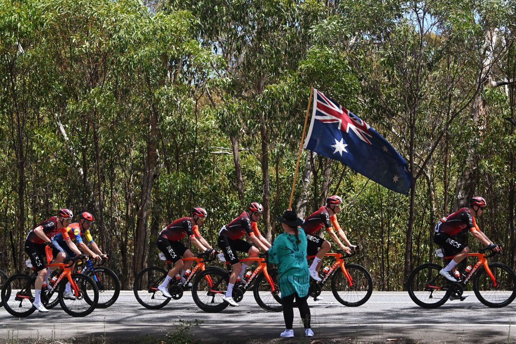GUMERACHA AUSTRALIA JANUARY 21 LR Connor Swift of The United Kingdom and Team INEOS Grenadiers Jacopo Mosca of Italy and Team Lidl Trek Ben Swift of The United Kingdom Lucas Hamilton of Australia and Sam Watson of The United Kingdom and Team INEOS Grenadiers compete while a fan cheers during the 25th Santos Tour Down Under 2025 Stage 1 a 1507km stage from Prospect to Gumeracha 342m UCIWT on January 21 2025 in Gumeracha Australia Photo by Dario BelingheriGetty Images