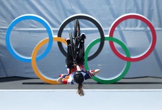 TOKYO JAPAN AUGUST 01 Charlotte Worthington of Team Great Britain performs a trick in front of the Olympic rings during the Womens Park Final run 2 of the BMX Freestyle on day nine of the Tokyo 2020 Olympic Games at Ariake Urban Sports Park on August 01 2021 in Tokyo Japan Photo by Jamie SquireGetty Images