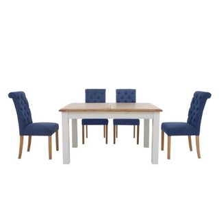 Wooden dining table with four blue chairs