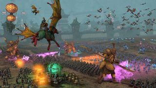 Armies clash in Total War: Warhammer 3 across land and air, including a giant, magical devices, a balloon, and flying horses