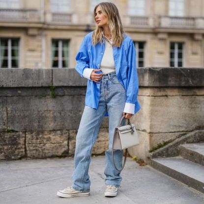 woman posing in jeans - best high street jeans
