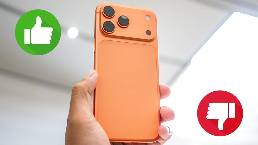 orange iphone 17 pro max with thumbs up and thumbs down icons