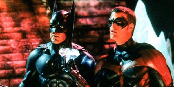 Batman and Robin George Clooney and Chris O&#039;Donnell in costume in front of some steps