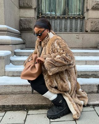  fur coat, Prada snow boots and leggings