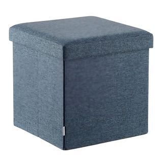 A blue storage ottoman seat on a white background